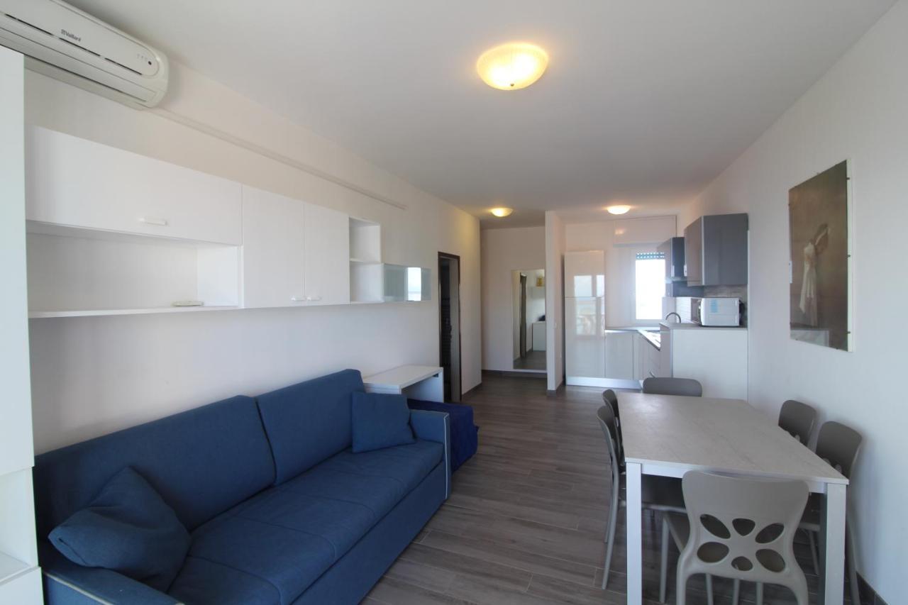 Appartamenti Puerto Do Sol Lignano Sabbiadoro Bagian luar foto